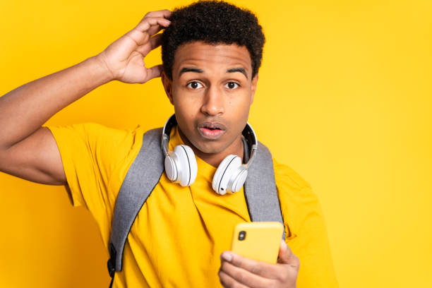 istock Surprised Man Looking at Phone 1919871345