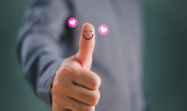 Customer experience concept. Thumb up happy smile face compliment, good feedback rating positive customer review, mine satisfaction survey, mental health assessment, feeling good mental health day
