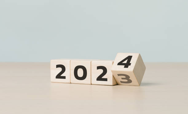 istock Starting new year 2024. Target and strategy concept. Schedule calendar future vision, Flipping of 2023 to 2024 on wooden cube blocks. Beginning and start. Business startup plan, Business Goals, Trend, 1919916131