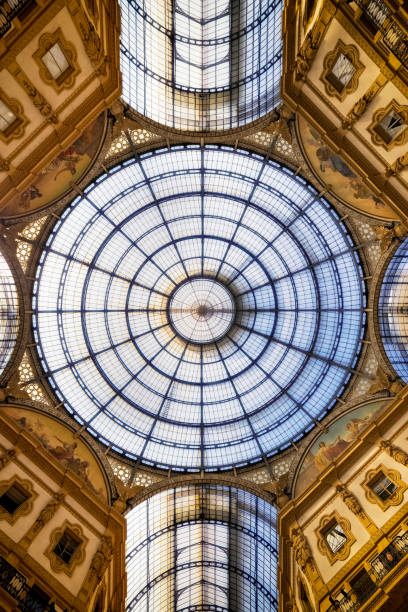 holidays in italy - inside the galleria vittorio emanuele ii in milan - milan italy contemporary architecture shopping photos et images de collection