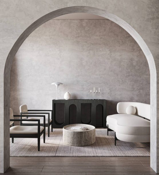 istock Boho beige livingroom interior design with 2 sofa, arch and grey stucco wall background. Light modern japanese nature view. 3d rendering mock up. High quality 3d illustration 1919965223