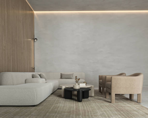 istock Gray minimal livingroom with large modular sofa, armchairs and illuminated ceiling background. Light modern japanese nature view. 3d rendering. High quality 3d illustration 1919978018