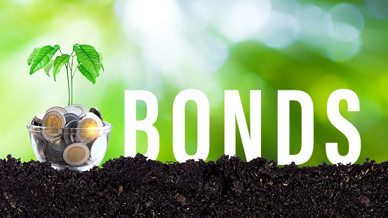 Bonds word icon virtual screen with coins stacked in increasing stacks. Bonds increasing concept, investment bond concept Raising Funds to Fund the Green Bond Program.
