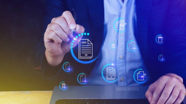 istock Businessman pressing multimedia type of modern buttons with virtual background, Document Management System (DMS), searching and managing corporate files information. 1919979618
