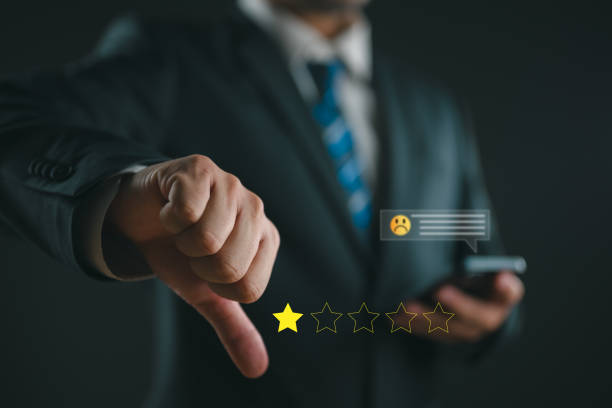 Customer Experience dissatisfied Concept, Unhappy Businessman Client with Sadness Emotion Face on virtual screen, Bad review, bad service dislike bad quality, low rating, social media not good.