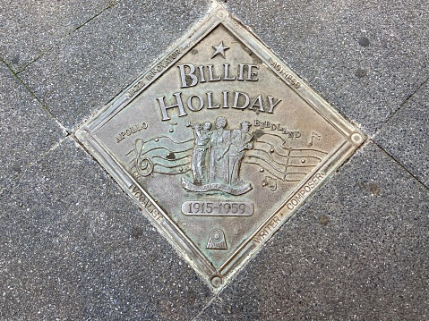 New York, NY USA - September 16, 2023 : Bronze plaque honoring singer Billie Holiday with an image of her singing \