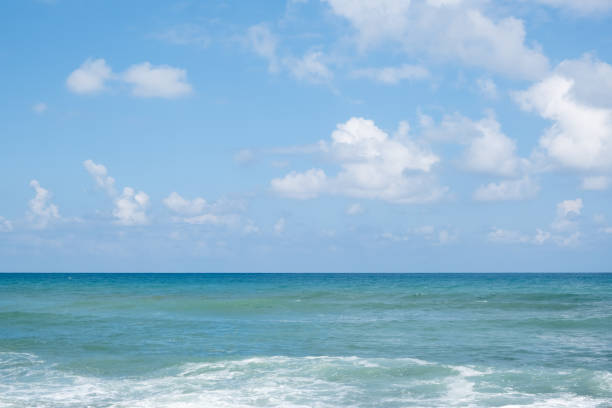 cloudy sky over the Mediterranean Sea horizon. The sea's waves magical tranquil seascape