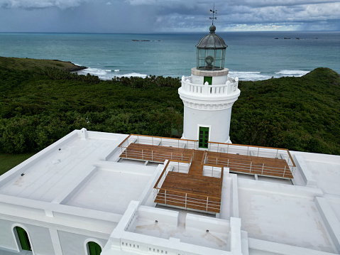 fajardo lighthouse aerial photo (drone shot of famous light house landmark on coast puerto rico) beach, sea, cabezas national park, caribbean sea (from above, looking down, ocean waves) scenic travel