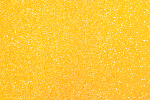 Yellow golden glittering background