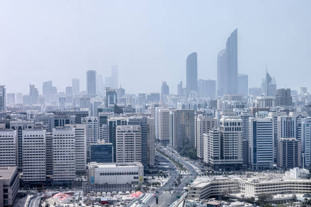 istock Aerial view on hazy Abu Dhabi cityscape at afternoon time 1920104879