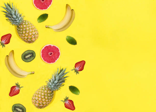 istock Fruit and berry on the yellow background. Copy space. Top view. Close-up. 1920128827