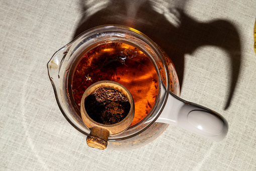 Tea jar and tea basked when brewing hot beverage