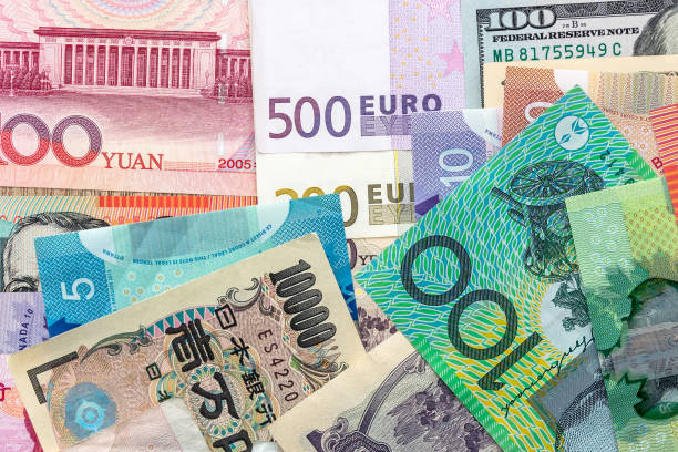 istock collection of money from different countries nearby 1920145924
