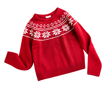 Red knitted Christmas ornated sweater isolated on white, winter holiday clothes. New year symbol. Knitwear. Traditional decorated jumper.