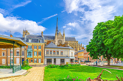 Amiens cityscape of old historical city centre with traditional houses, Amiens Cathedral Basilica of Our Lady Notre-Dame, Square Jules Bocquet, blue sky, Hauts-de-France Region, France landmarks