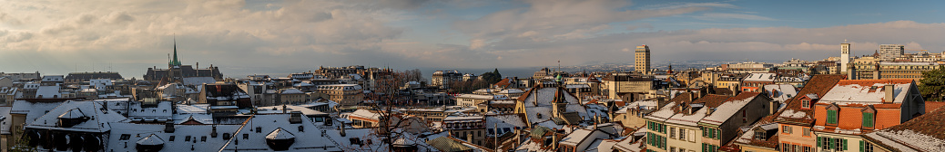 Winter landscape of City of Lausanne, Vaud Canton, Switzerland. Houses using Energy for Heating. Bel-air tower.
