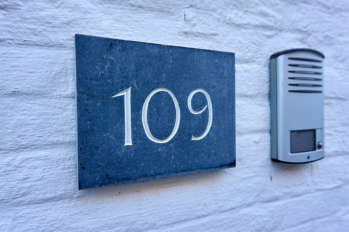Close up of an house door number 109