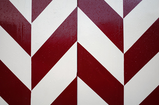 Part of an old door, painted in red and white. In this case the colors of the town Amersfoort.