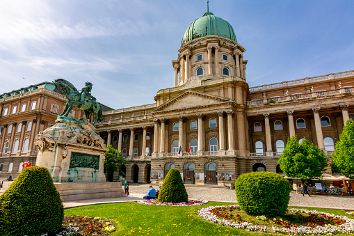 Budapest, Hungary - April 2019: Royal palace of Buda and Prince Eugene of Savoy statue in Budapest