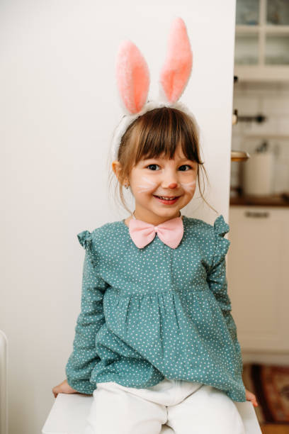 istock Sweet little girl with Easter bunny costume and make 1920301721