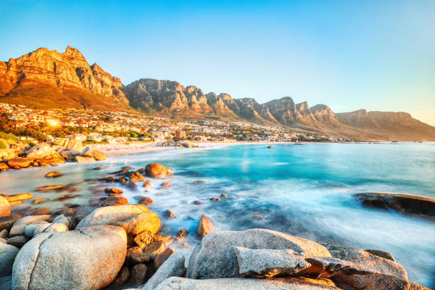 istock Cape Town Sunset over Camps Bay Beach with Table Mountain and Twelve Apostles in the Background 1920368621