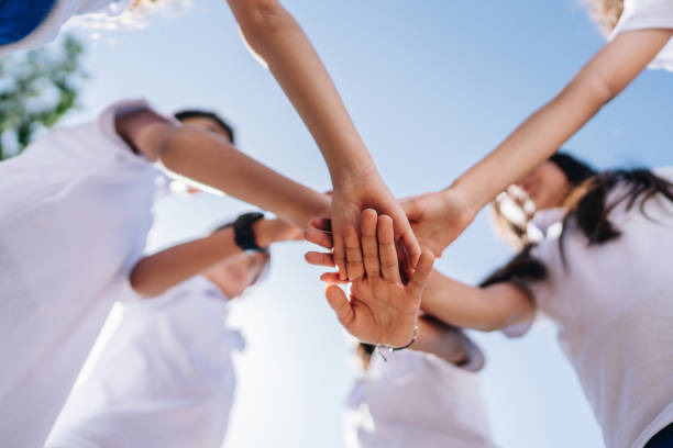 istock Close-up of children's hands clasped 1920374896