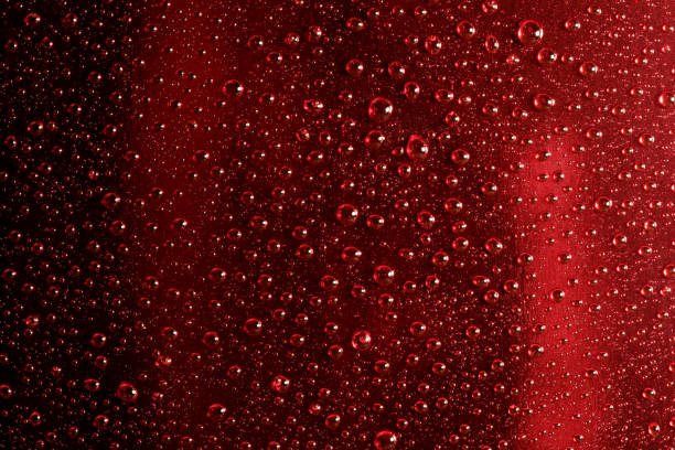 Close-up of soap sud on a red background.