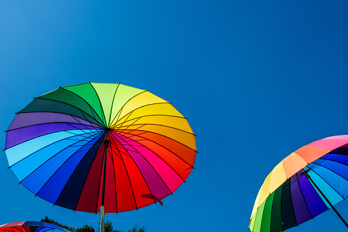 Umbrellas with the colors of the rainbow at pride