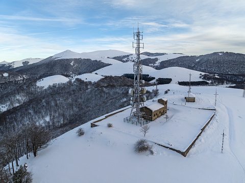 Communication antennas on snowy mountain. Belate, Navarra