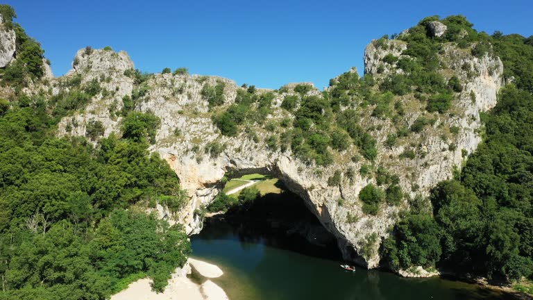 The famous and majestic Pont d'Arc in the Gorges de l'Ardèche in Europe, France, in summer on a sunny day.