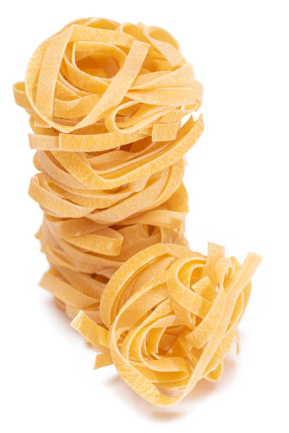 istock Five Classic Italian Raw Egg Fettuccine - Isolated on White Background 1920560806