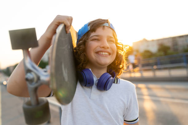 istock Carrying skateboard in the 80's style 1920620996
