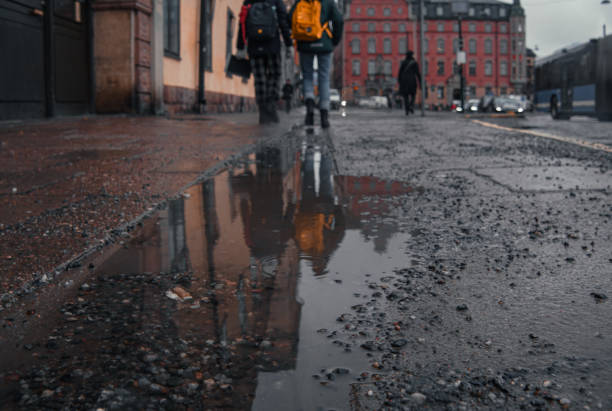 istock Close up of a puddle on a street 1920626452