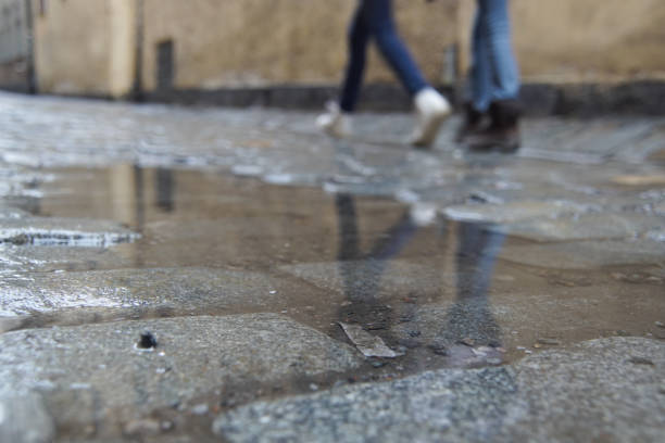istock Close up of a puddle on a street 1920626967