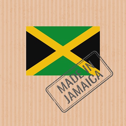 Made in Jamaica badge vector. Sticker with Jamaican national flag. Ink stamp isolated on paper background.