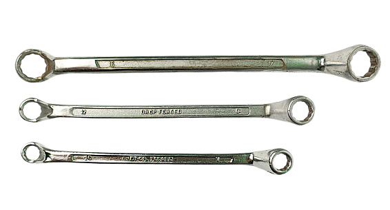A combination open-ended and box-ended wrench.