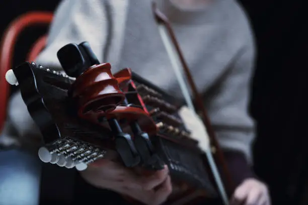 Photo of Nyckelharpa's distinctive play showcases intricate craftsmanship