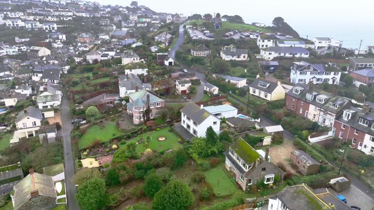 The reverse reveal of a quaint old English village of Polruan Cornwall