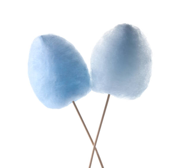 istock Sticks with yummy cotton candy isolated on white 1920850175