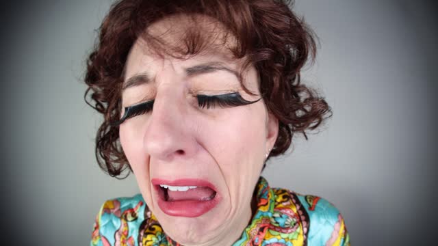 Middle Aged Woman From the 60s Sobbing and Crying Funny Fisheye Lens