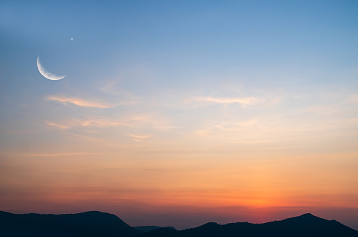 Moon and Venus during sunrise over the appalachian Mountains. Great Smoky Mountains National Park, Tennessee