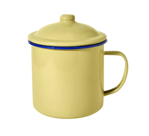 istock Vintage enamel mug with cover isolated on white background 1920948840