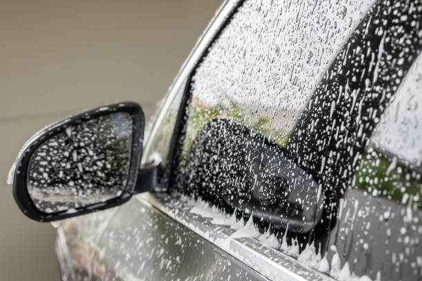 istock car cleaning and washing with foam soap 1920951449