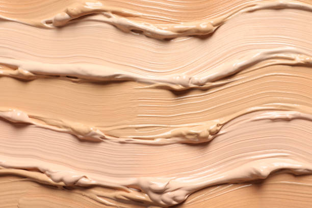 istock Samples of skin foundation as background, closeup 1920980277