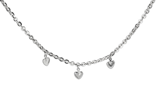 One metal chain with heart pendants isolated on white. Luxury jewelry