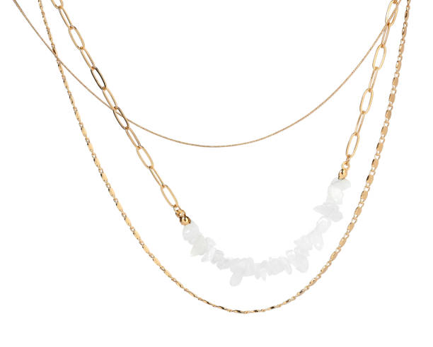 istock Metal chains with gemstones isolated on white. Luxury jewelry 1920987586