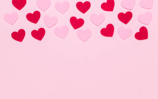 istock Carved red and pink hearts on a pink background. 1921015277