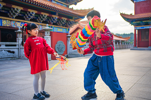 Brother and sister celebrate the Spring Festival at Qingyun Zen Temple in Shantou  Guangdong, China,Celebrate the Chinese Spring Festival.