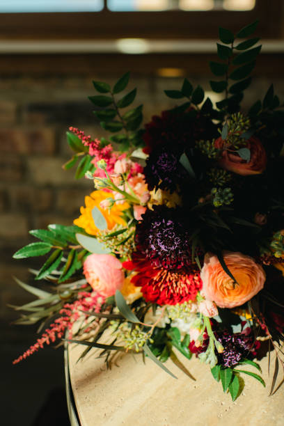 istock Colorful floral bouquet on table top in warm sunlight indoors 1921098238