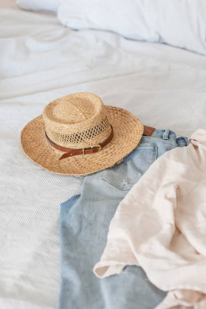istock packing vacation sunhat and outfit 1921110276
